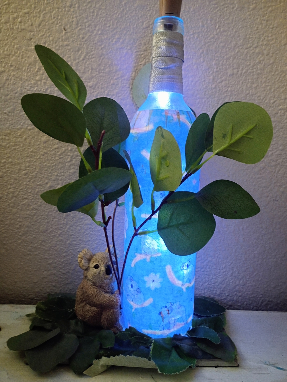 Hand Crafted  Glowing Bottle Lantern "Outback Oasis" with Green Faux Leaves